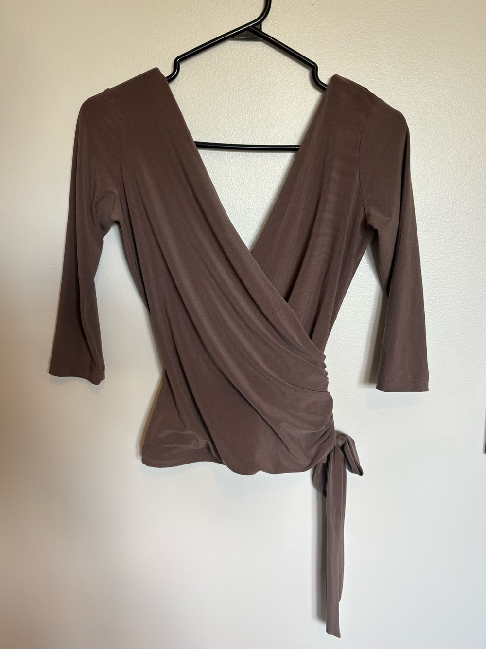brown wrap-style 3/4 sleeve top with side tie